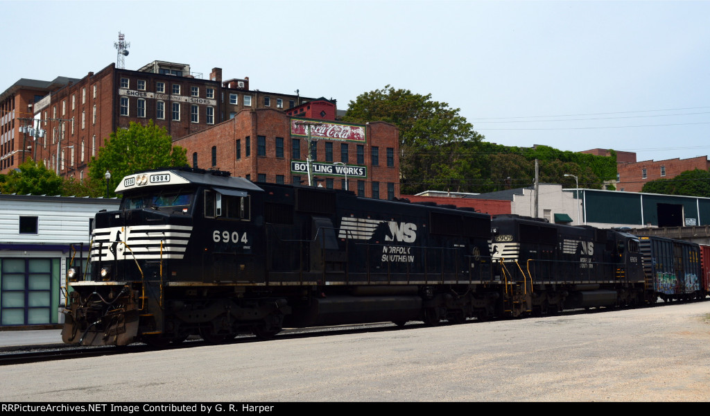 The E19 made several back and forth moves switching cars in the interchange yard out of sight.